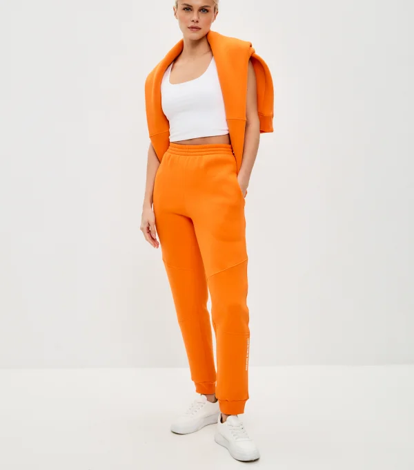 Джоггеры с начесом оранжевые