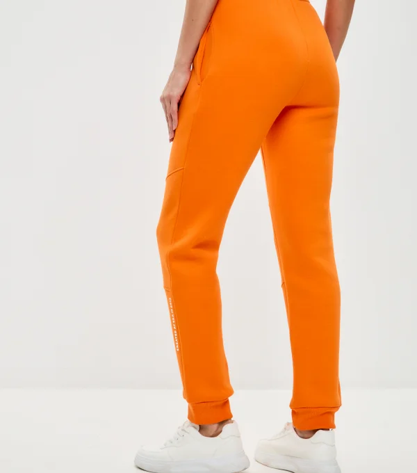 Джоггеры с начесом оранжевые